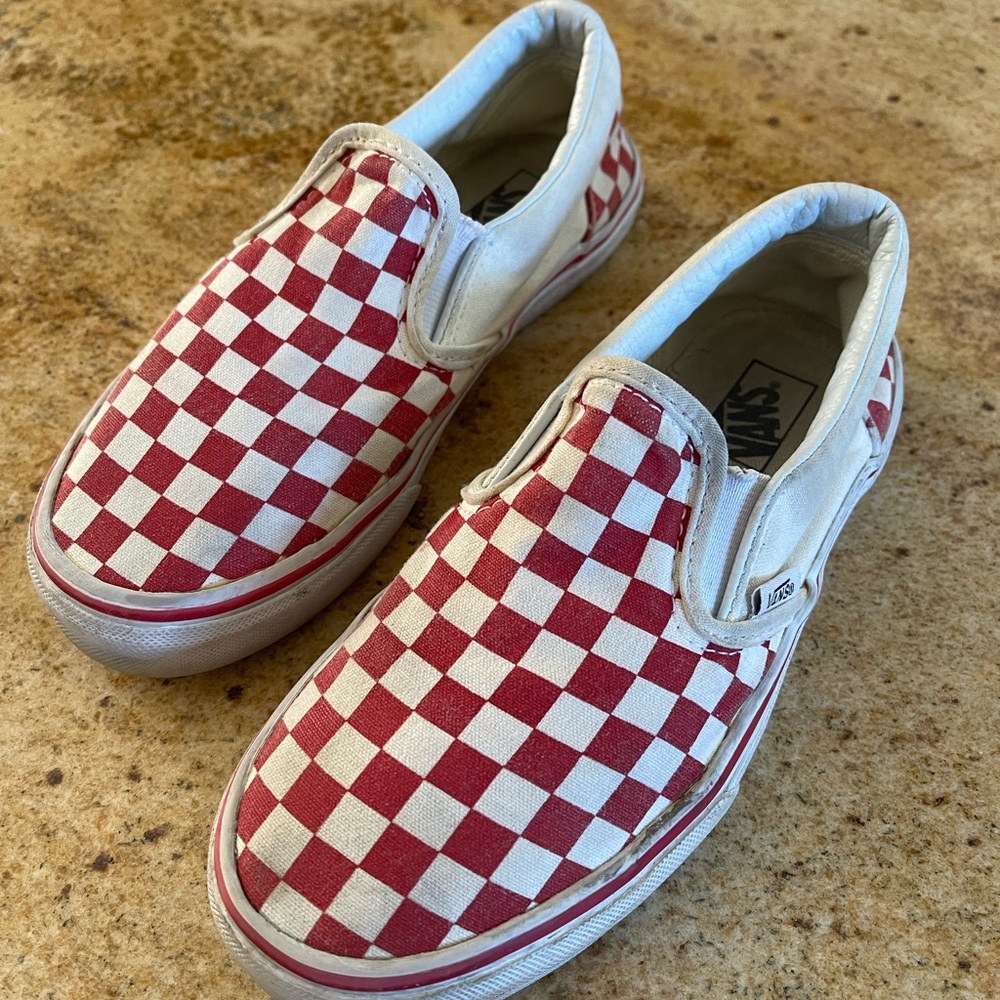Red checkerboard slip on vans
